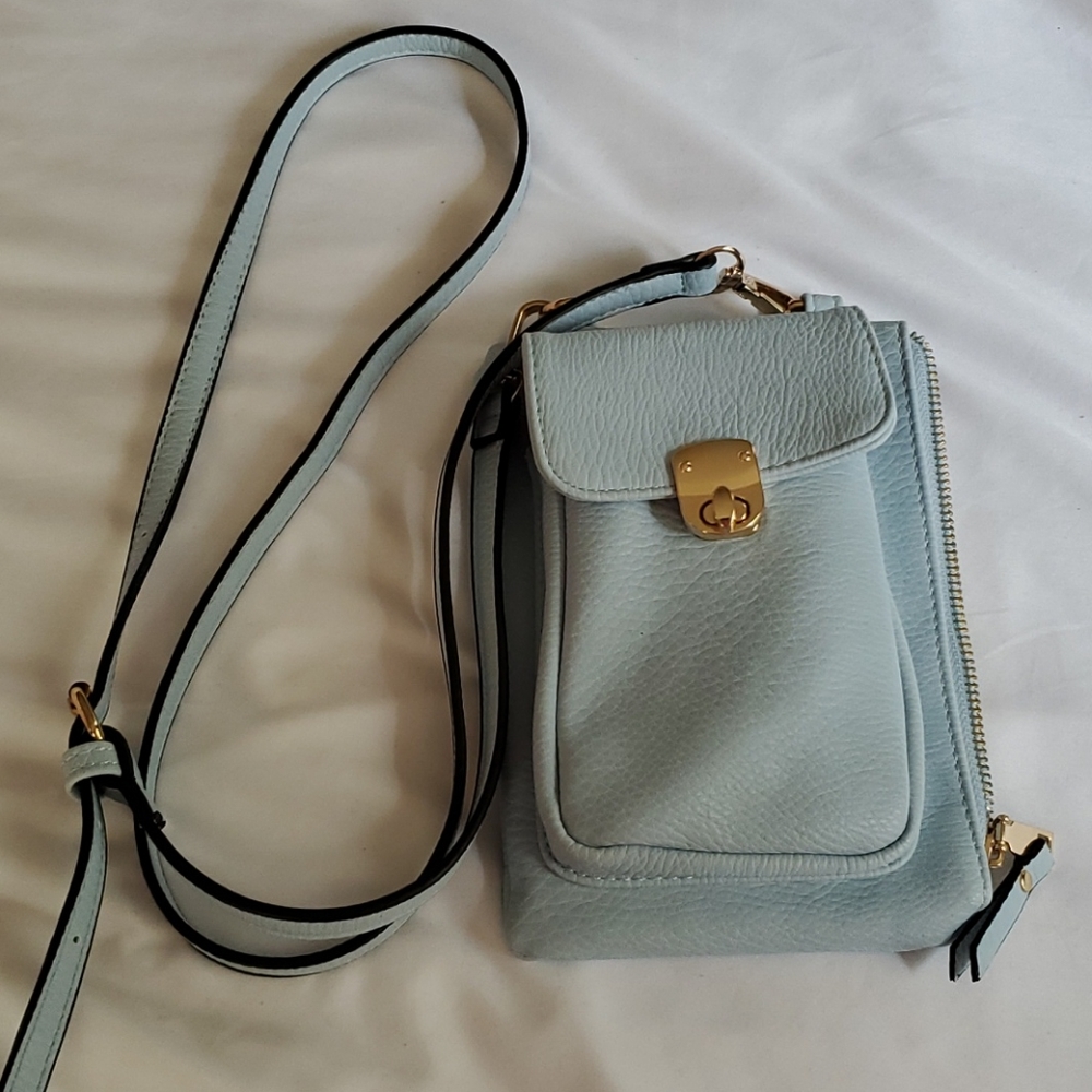 - Crossbody bag with place in front for phone